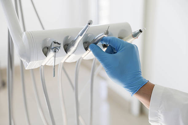 Professional Emergency Dentist technician working in Myrtle Grove, NC